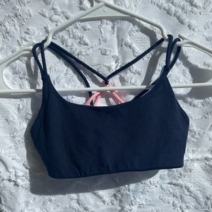 navy blue and pink ivivva sports bra
